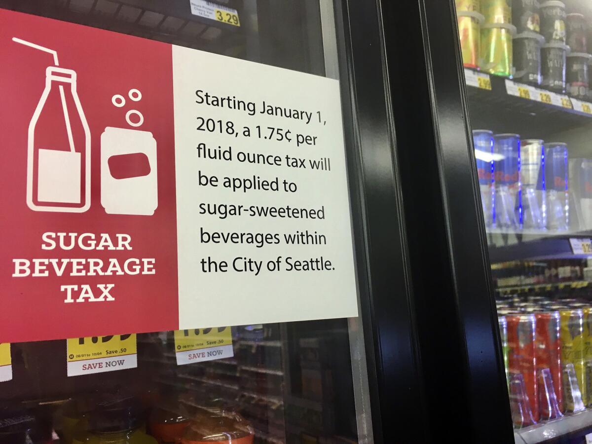 Local soda taxes, such as one in Seattle, will be banned if voters in Washington State pass a ban on "grocery" taxes on Tuesday.