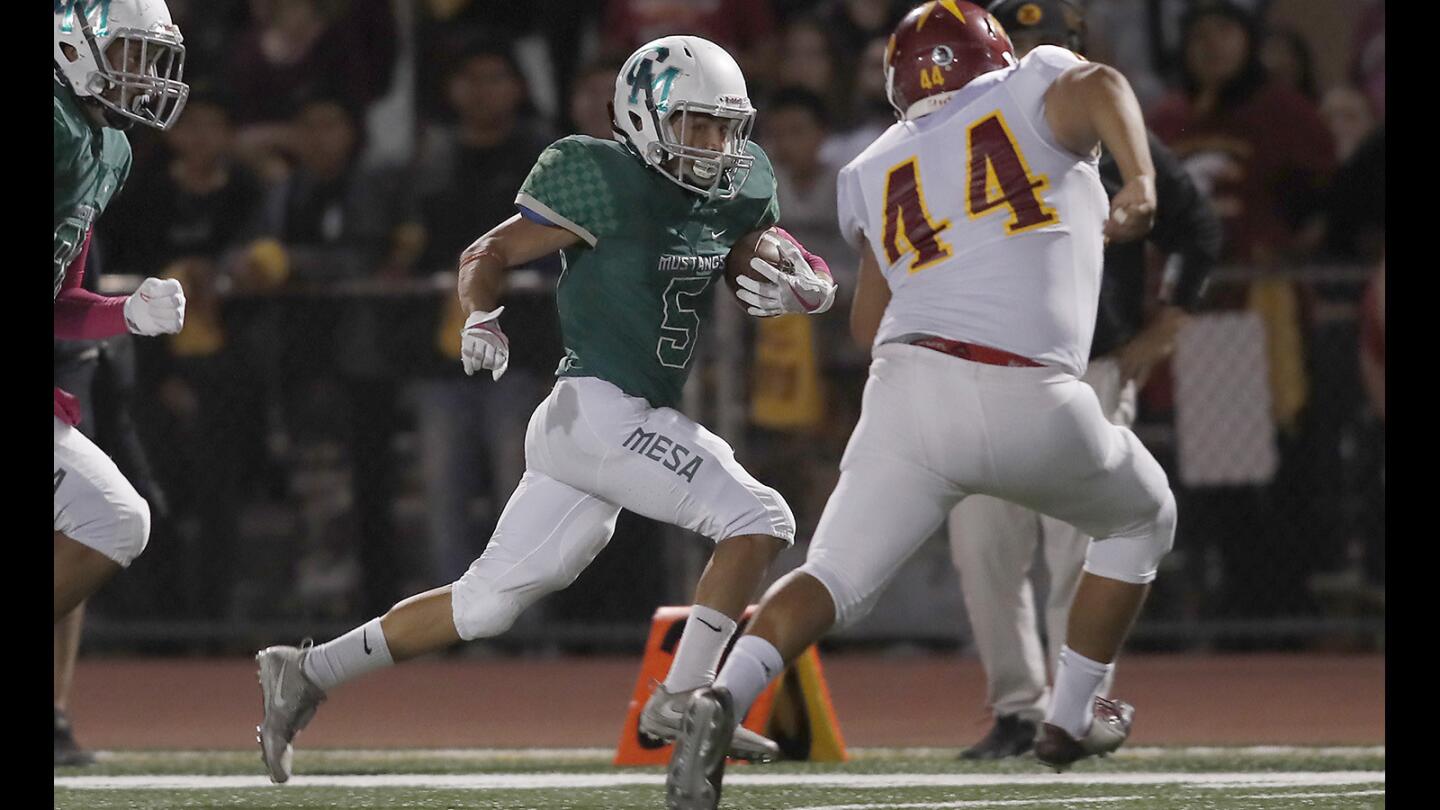 Photo Gallery: Costa Mesa High vs. Estancia in the Battle for the Bell football game
