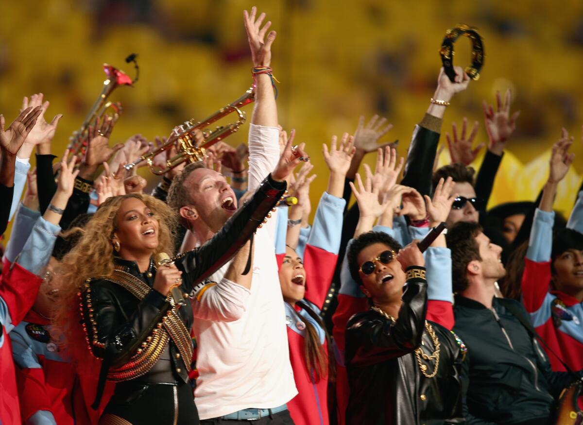 Beyoncé, Chris Martin of Coldplay and Bruno Mars perform during the Pepsi Super Bowl 50 halftime show at Levi's Stadium in Santa Clara, Calif., on Sunday.