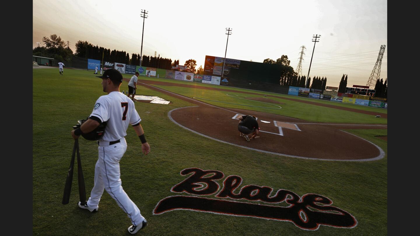 Bakersfield Blaze infielder Justin Seager walks on to the durgoutbefore the start of a gameagainst the Stockton Ports at Sam Lynn Ballpark.