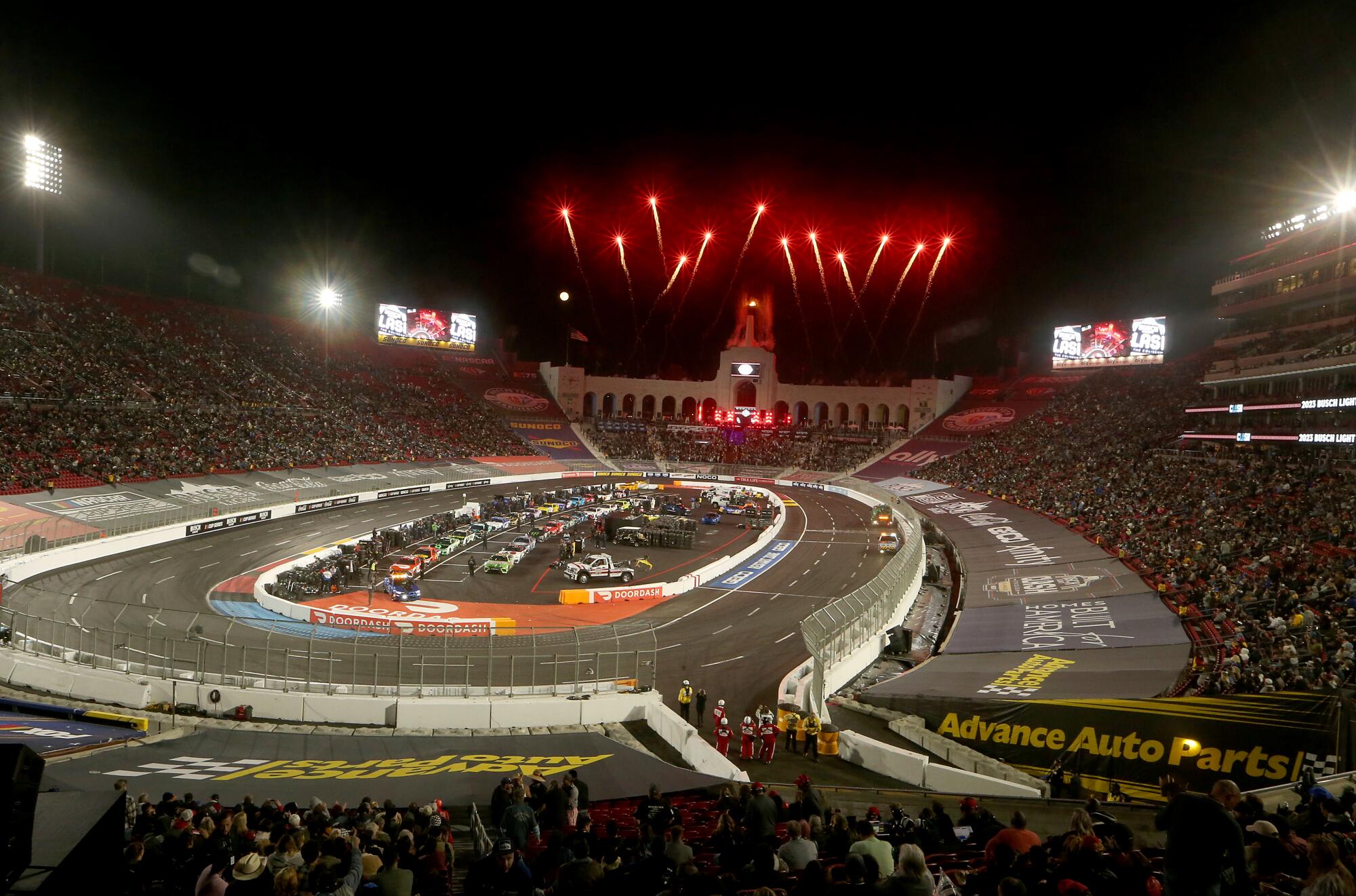 Fireworks light up the night sky during an intermission for NASCAR's Clash at the Coliseum.