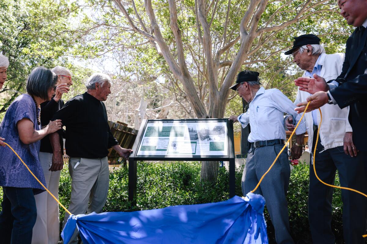 Japanese incarceration survivors and others unveil a new plaque in Griffith Park.