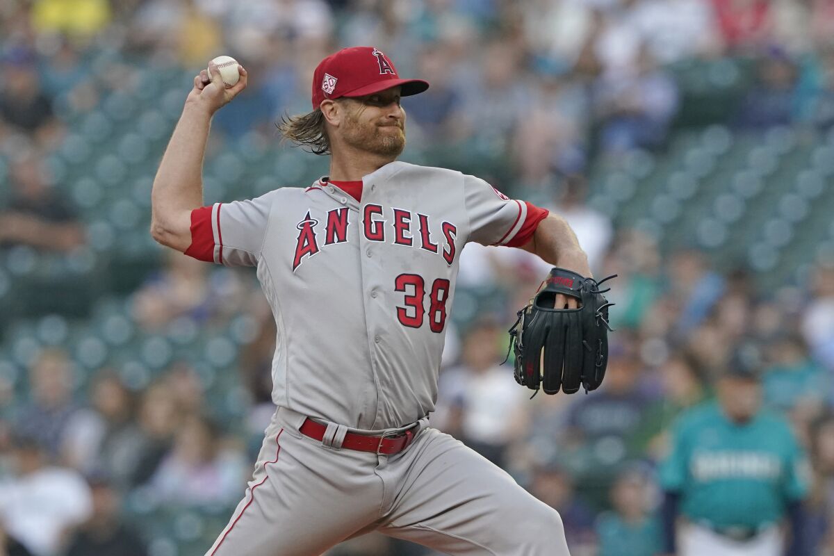 Angels starting pitcher Alex Cobb throws against the Seattle Mariners on July 9.