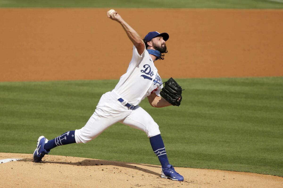 Dodgers pitcher Tony Gonsolin throws to the Seattle Mariners during the first inning at Dodger Stadium.