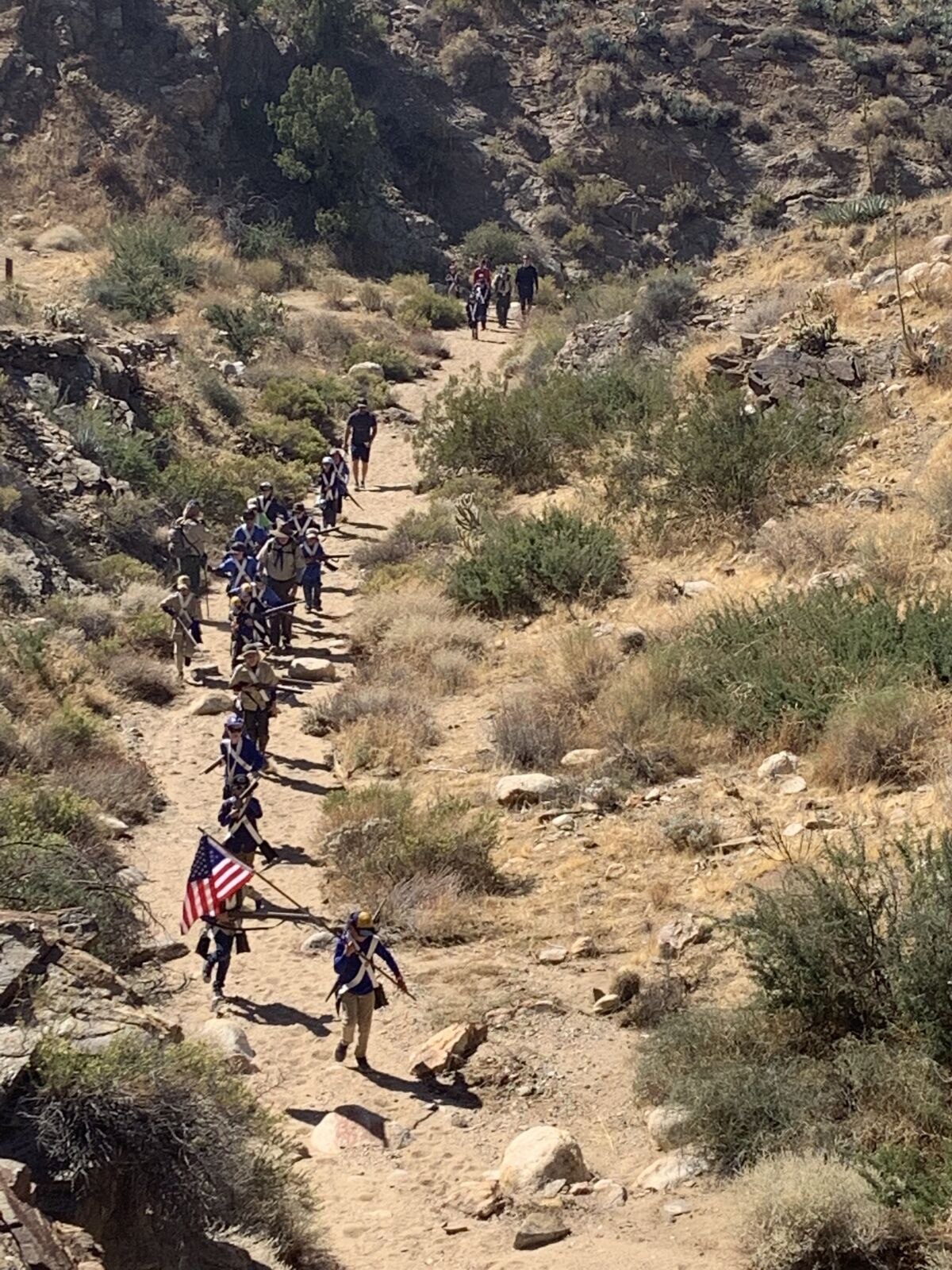 A group of 30 local Cub Scouts enter Box Canyon near Julian on Saturday, Oct. 19, in a re-creation of a portion of the Mormon Battalion's historic 2,000-mile march from Iowa to San Diego in 1846 and 1847. The Scouts did the five-mile hike on the same trail the battalion marched to earn a High Adventure Award from the San Diego-Imperial Council of Boy Scouts of America.local