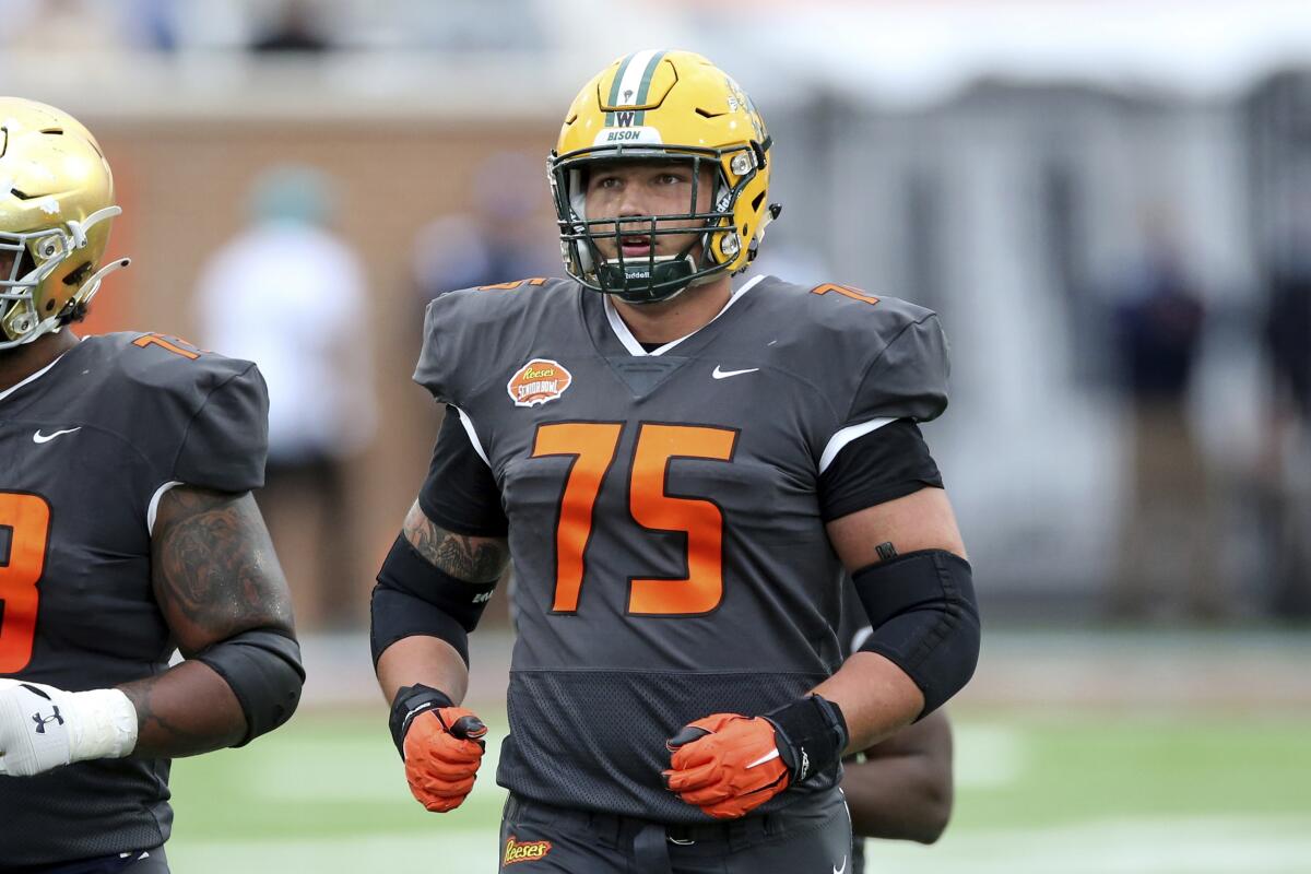 Titans draft Dillon Radunz for right tackle, add 2 more on D - The San  Diego Union-Tribune