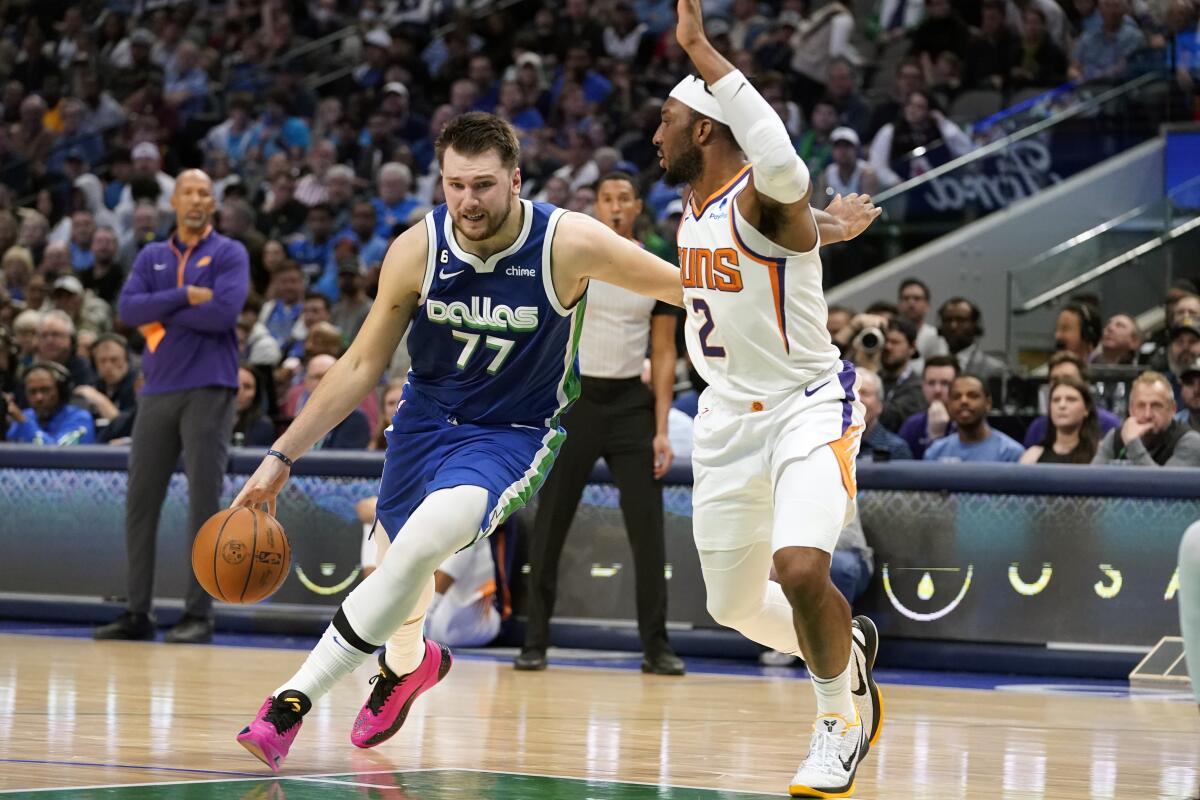 Luka Doncic of the Dallas Mavericks looks on against the Phoenix