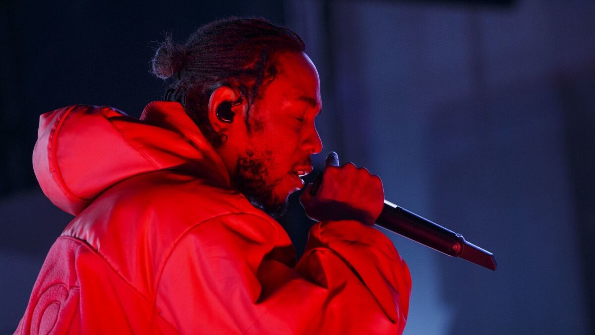 Artist Kendrick Lamar performs at L.A. Live.