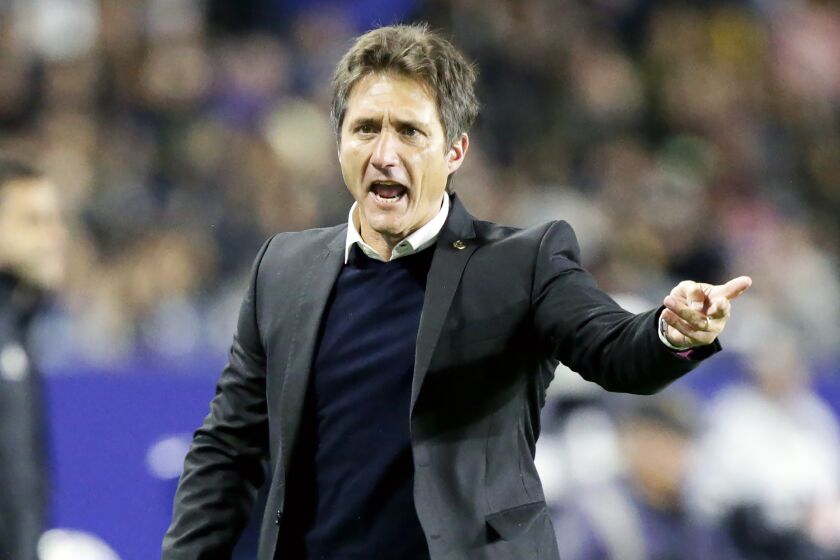 LA Galaxy head coach Guillermo Barros Schelotto reacts to a sideline judges call during the first.