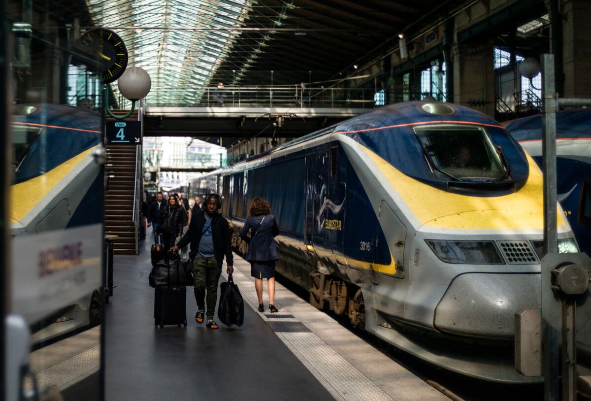 Passengers arrive at Gare du Nord station in Paris after traveling on a Eurostar train from London in April 2019. 