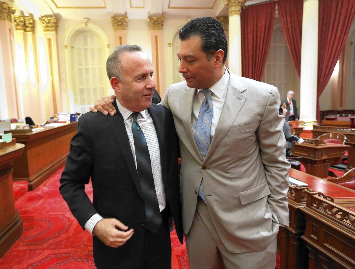 Senate President Pro Tem Darrell Steinberg, left, and Sen. Alex Padilla walk out of the Senate chambers together Friday. Both are leaving the Legislature because of term limits.