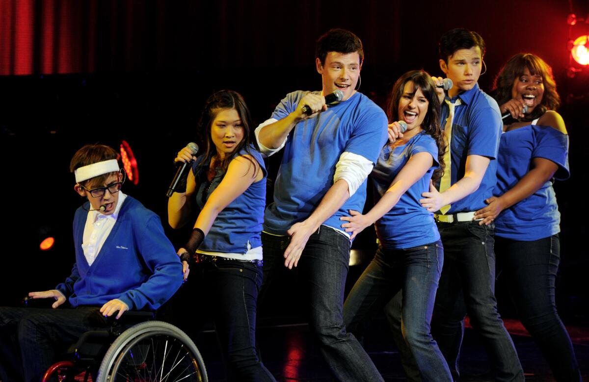 (L-R) Actor/singers Kevin McHale, Jenna Ushkowitz, Cory Monteith, Lea Michele, Chris Colfer and Amber Riley of Fox TV's "Glee" perform at The Gibson Amphitheater in 2010.