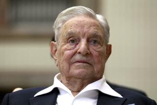 FILE - George Soros, Founder and Chairman of the Open Society Foundations, looks before the Joseph A. Schumpeter award ceremony in Vienna, Austria, Friday, June 21, 2019. The major philanthropy, Open Society Foundations, has committed $50 million to increase civic engagement among women and youth over the next three years as part of its strategy to support democracy in the U.S. (AP Photo/Ronald Zak, File)