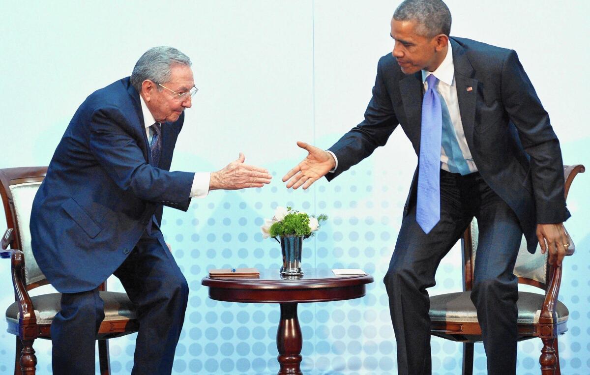 President Obama and Cuban President Raul Castro greet each other in Panama City, as relations were thawing last April.