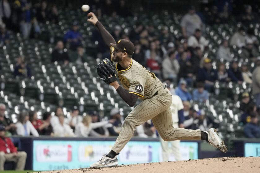 San Diego Padres pitcher Dylan Cease throws during the first inning of a baseball game against the Milwaukee Brewers Tuesday, April 16, 2024, in Milwaukee. (AP Photo/Morry Gash)