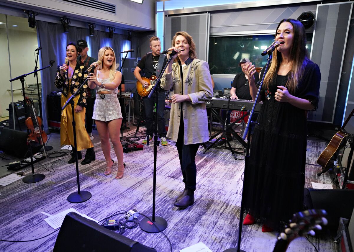 Amanda Shires, left, Maren Morris, Brandi Carlile and Natalie Hemby of the Highwomen perform on SiriusXM's Highway Channel at the SiriusXM Studios in New York City back in July.