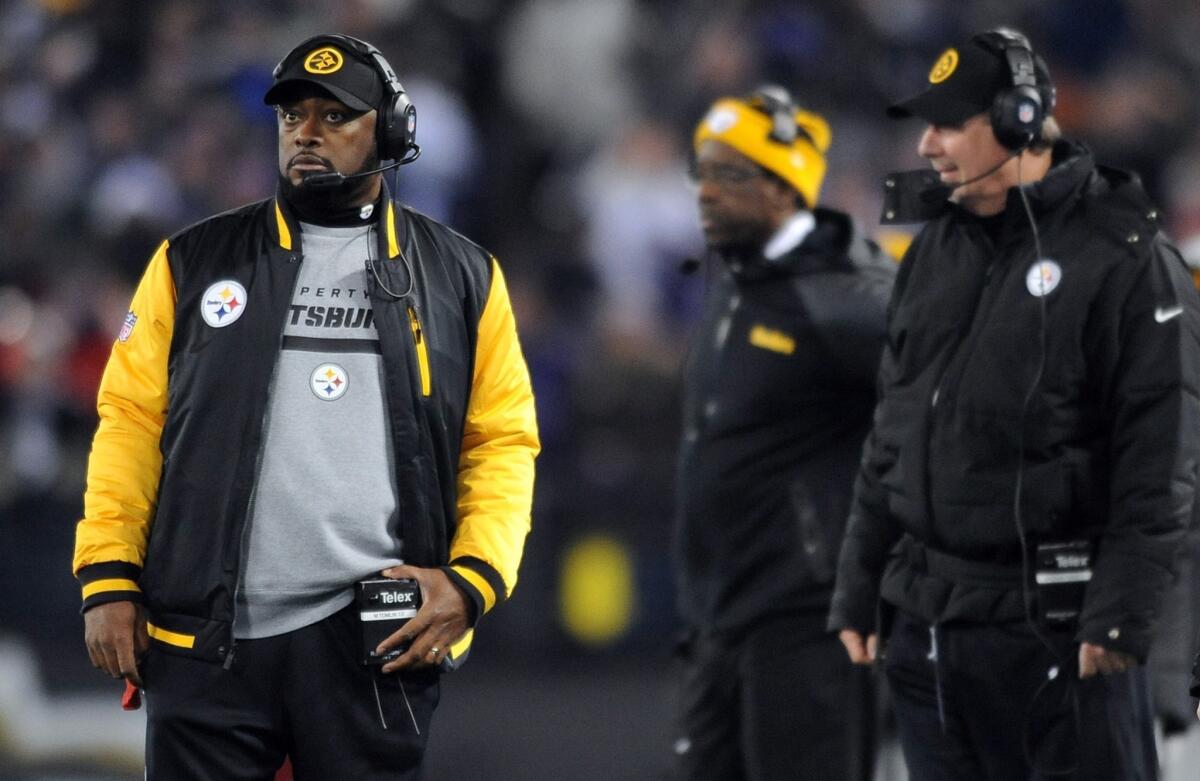 Pittsburgh Coach Mike Tomlin watches from the sideline during the Steelers' 22-20 loss to the Baltimore Ravens on Thanksgiving night.
