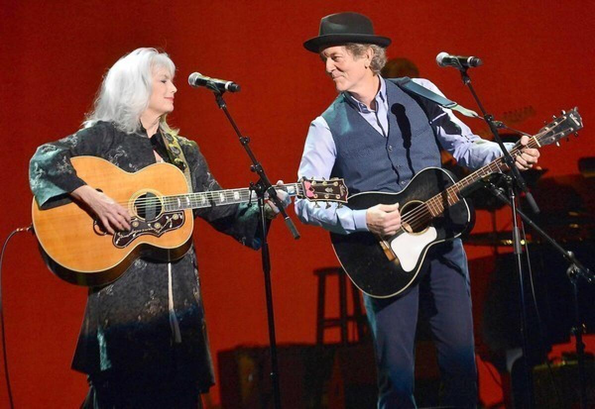 Singers-songwriters Emmylou Harris and Rodney Crowell backstage at the Saban Theater on Feb. 7, 2013, in Los Angeles.