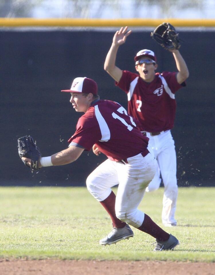 Estancia High's Dylan Laurent, right, celebrates as teammate Jackson Letterman, left, secures the last out to beat Costa Mesa, 2-0, on Wednesday.