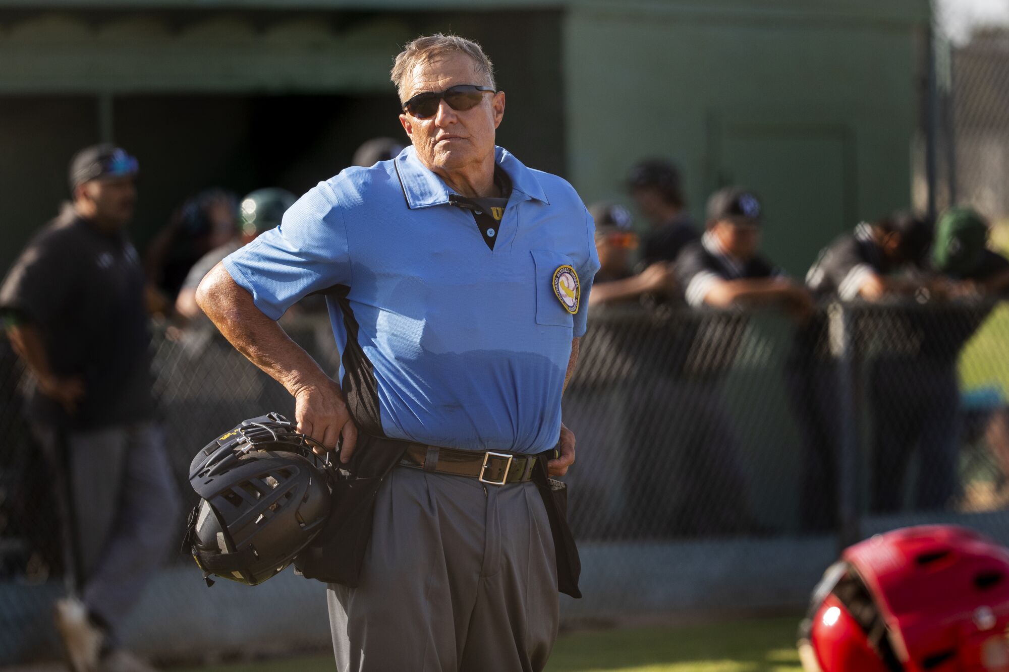 Umpire Jim Trentin stands by home plate.