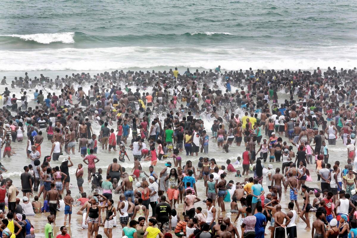New Year's revelers gather on the North Pier Beach in Durban, South Africa, on Jan. 1.