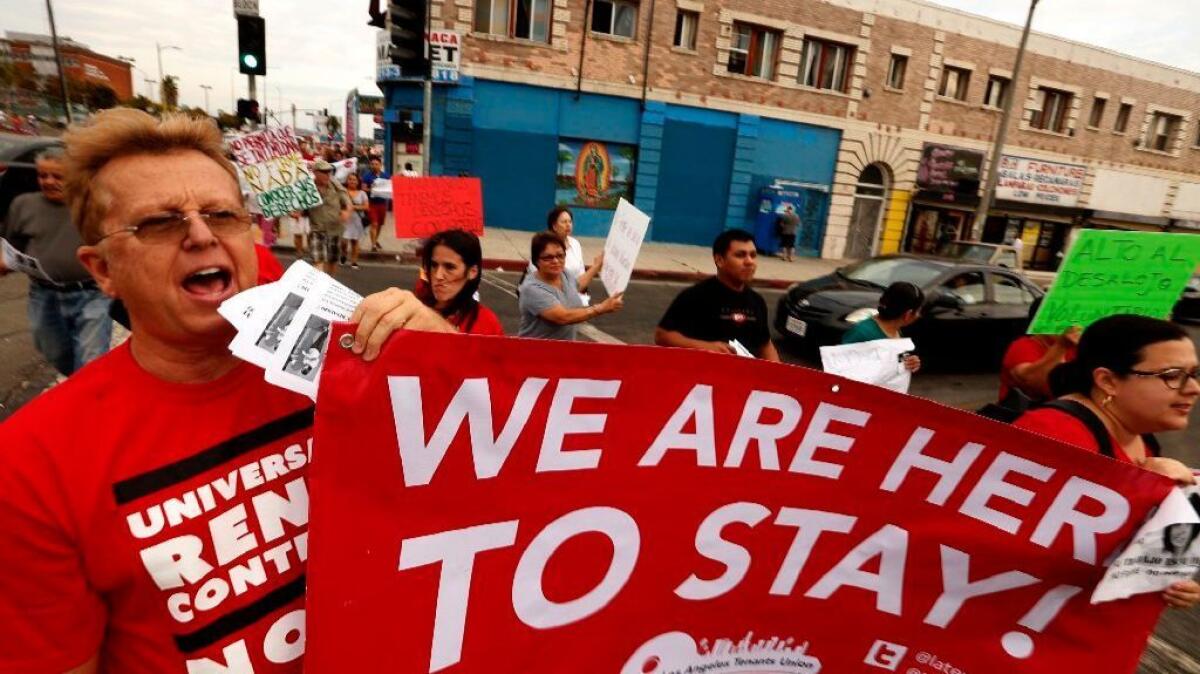 A tenant protest is held in 2016 in Koreatown against alleged intimidation tactics by landlords.