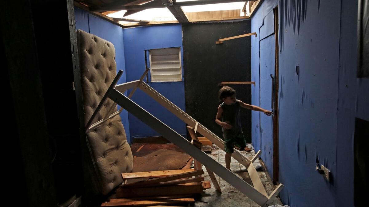 A damaged residence in La Perla. As in all of Puerto Rico, the residents are without power or running water.