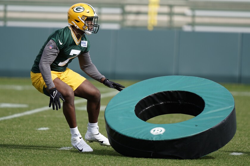 Quay Walker does some drills during the Packers mandatory minicamp