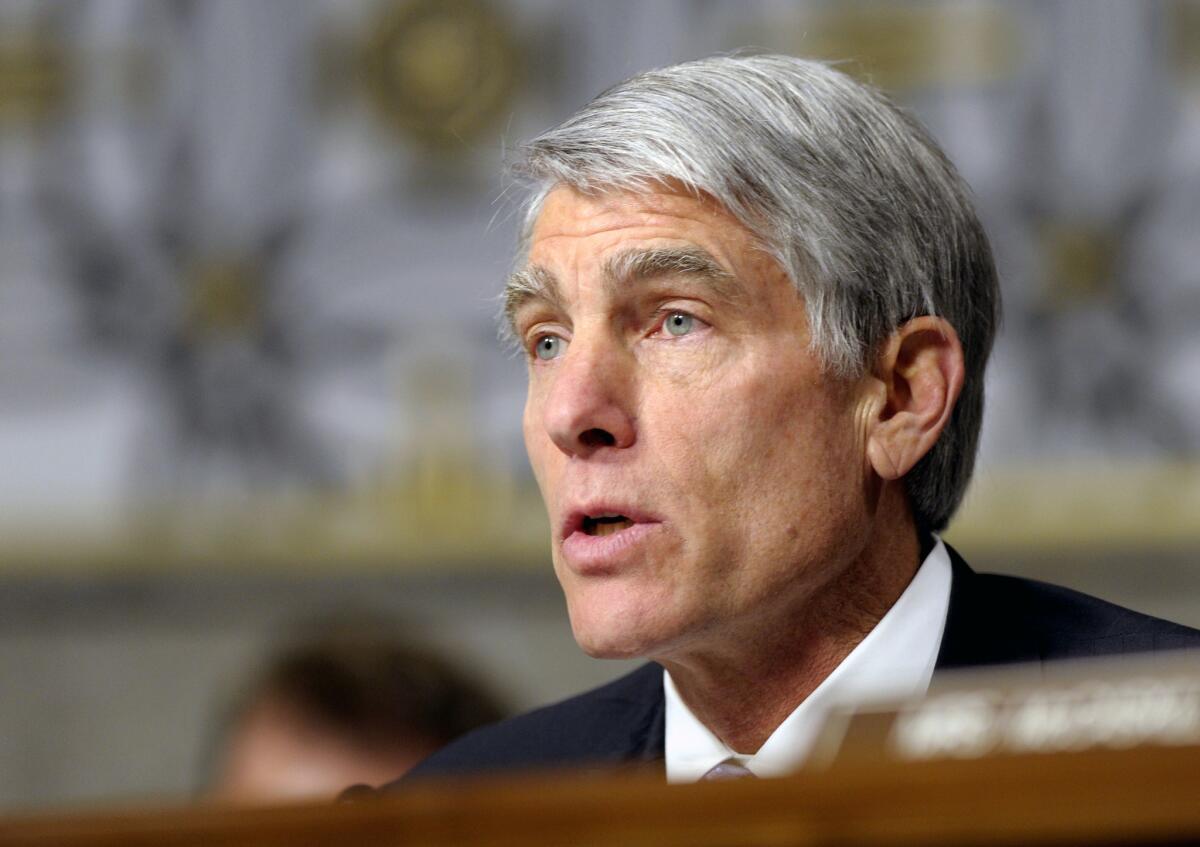 Sen. Mark Udall apologized for invoking two dead U.S. journalists in a debate over the weekend.