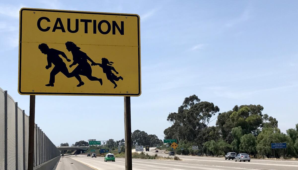 Immigrant crossing caution signs once dotted Interstate 5 in San Diego County. The last one vanished in 2017.