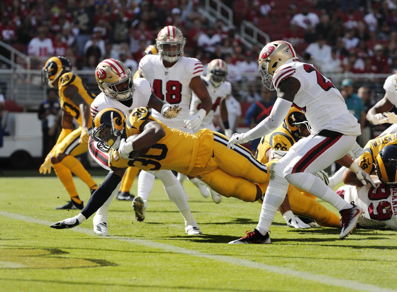 Rams running back Todd Gurley (30) scores on a 7-yard run against San Francisco 49ers in the first half at Levi's Stadium on Sunday in Santa Clara.