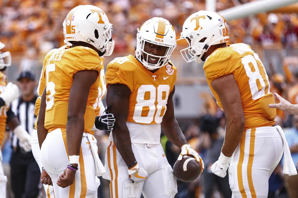 Tennessee tight end Princeton Fant (88) celebrates with teammates scoring a touchdown during the first half of an NCAA college football game against Alabama, Saturday, Oct. 15, 2022, in Knoxville, Tenn. (AP Photo/Wade Payne)