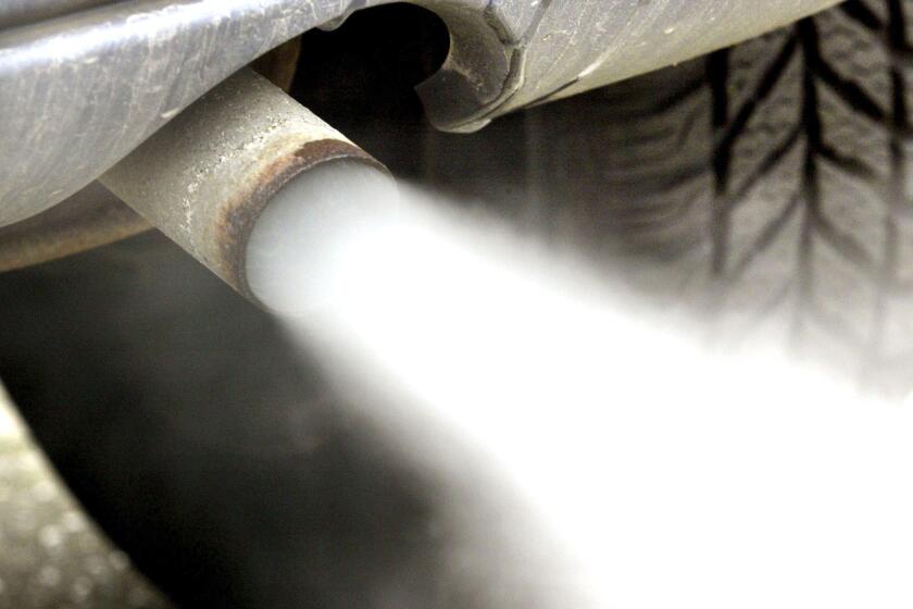 FILE -- In this Tuesday, Jan. 27, 2004 file photo exhaust gases leave the exhaust pipe of a car in Frankfurt, Germany. (AP Photo/Michael Probst, file)