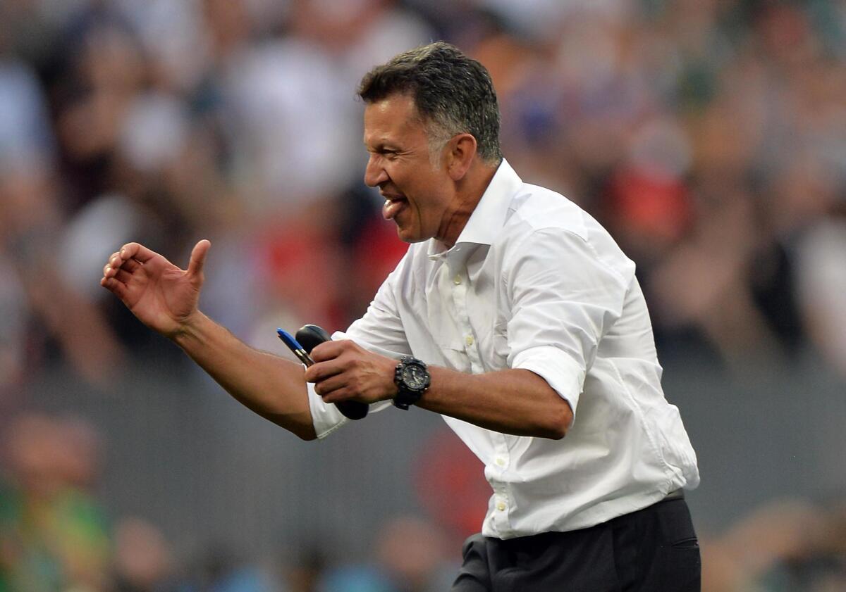 Mexico's coach Juan Carlos Osorio reacts after winning the FIFA World Cup 2018 group F preliminary round soccer match between Germany and Mexico in Moscow, Russia, 17 June 2018.