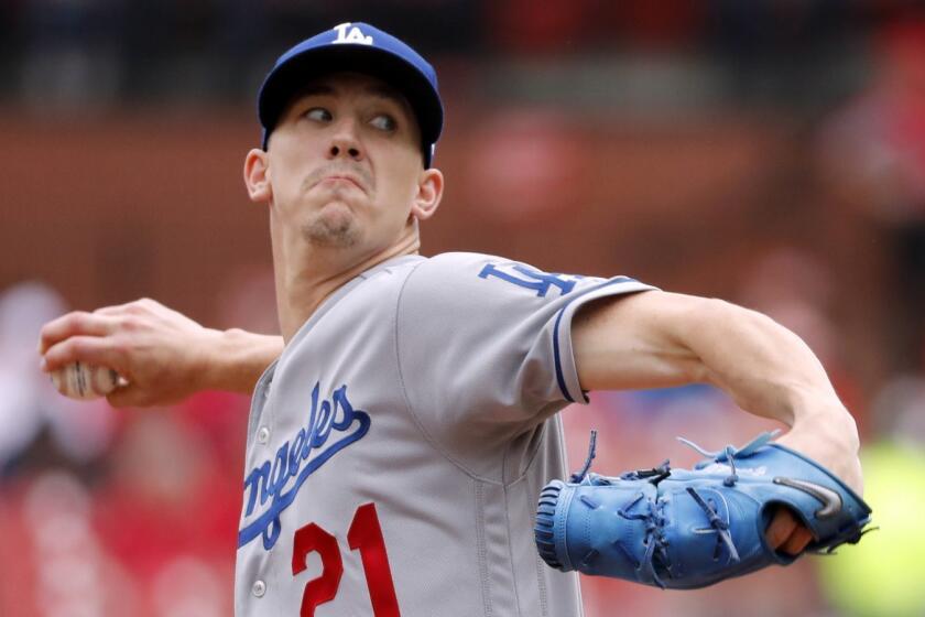 Los Angeles Dodgers starting pitcher Walker Buehler throws during the first inning of a baseball game against the St. Louis Cardinals Thursday, April 11, 2019, in St. Louis. (AP Photo/Jeff Roberson)