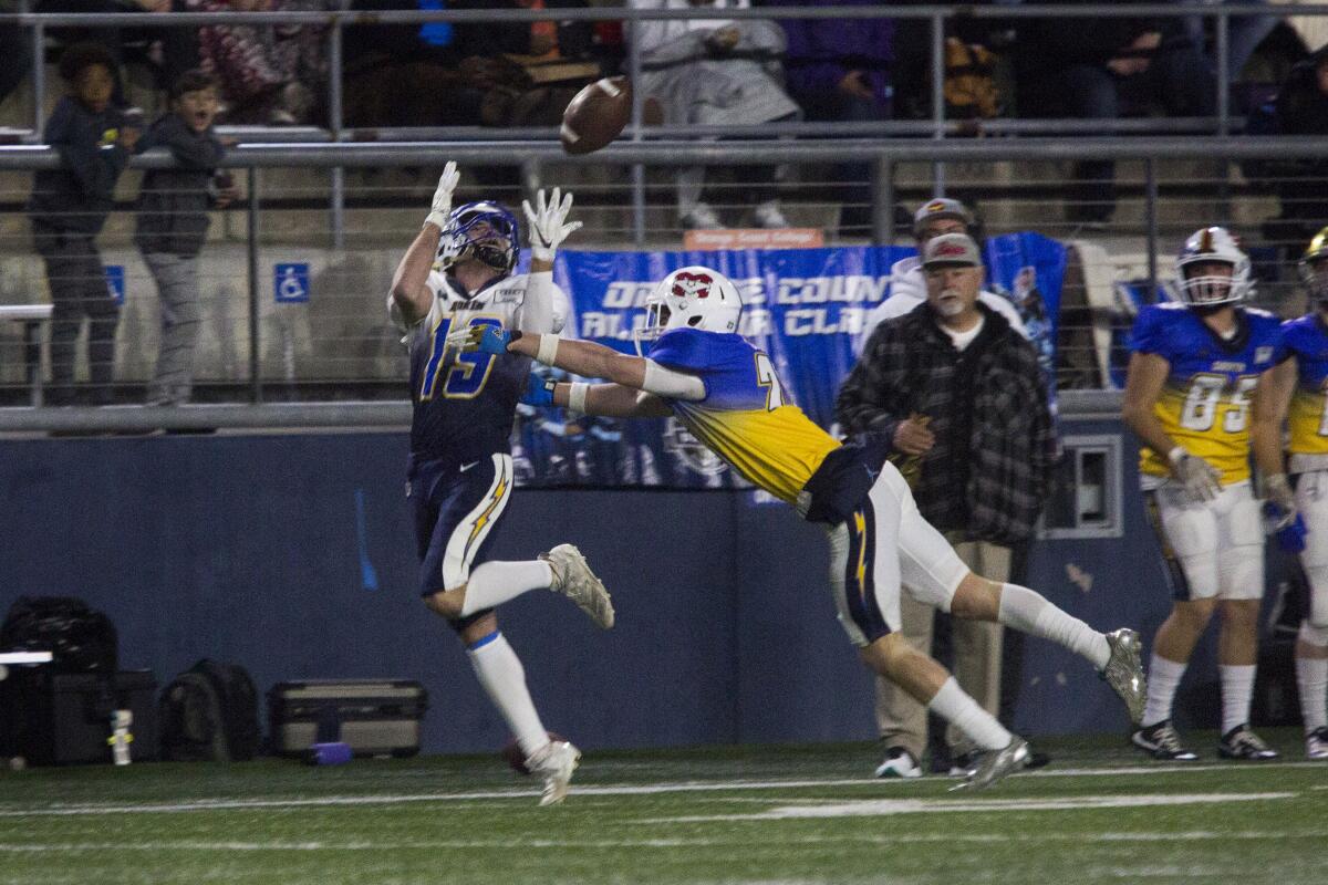 La Habra's Kristopher Koontz reels in a long pass during the Orange County North vs. South All-Star Classic on Jan. 25.