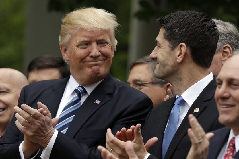 President Donald Trump talks with House Speaker Paul Ryan of Wis., in the Rose Garden of the White House in Washington, Thursday, May 4, 2017, after the House pushed through a health care bill. House Majority Whip Steve Scalise of La. is at left, and House Ways and Means Committee Chairman Rep. Kevin Brady, R-Texas is at right. (AP Photo/Evan Vucci)