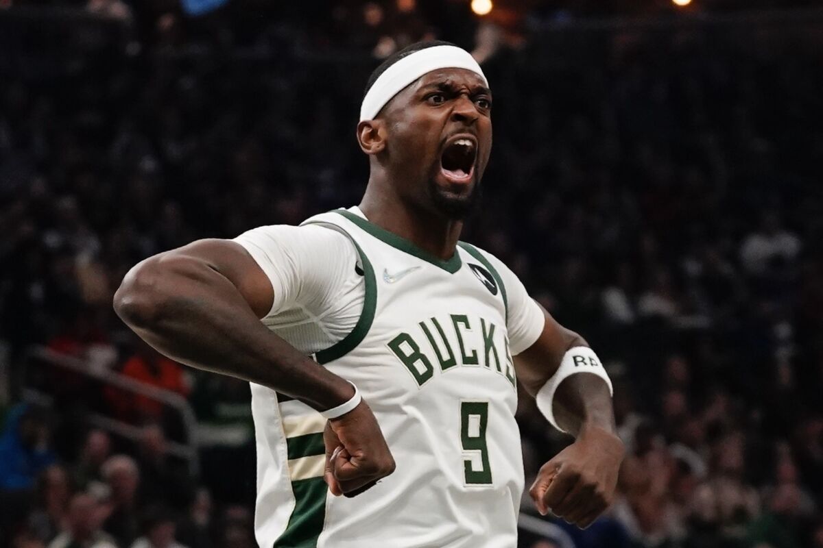 Milwaukee Bucks forward Bobby Portis reacts after a dunk during the first half of an NBA basketball game against the Boston Celtics on Thursday, April 7, 2022, in Milwaukee. (AP Photo/Morry Gash)