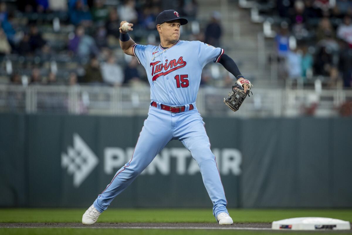 Twins third baseman Gio Urshela fields a ball hit by the White Sox in the first inning of a game Sept. 27, 2022.