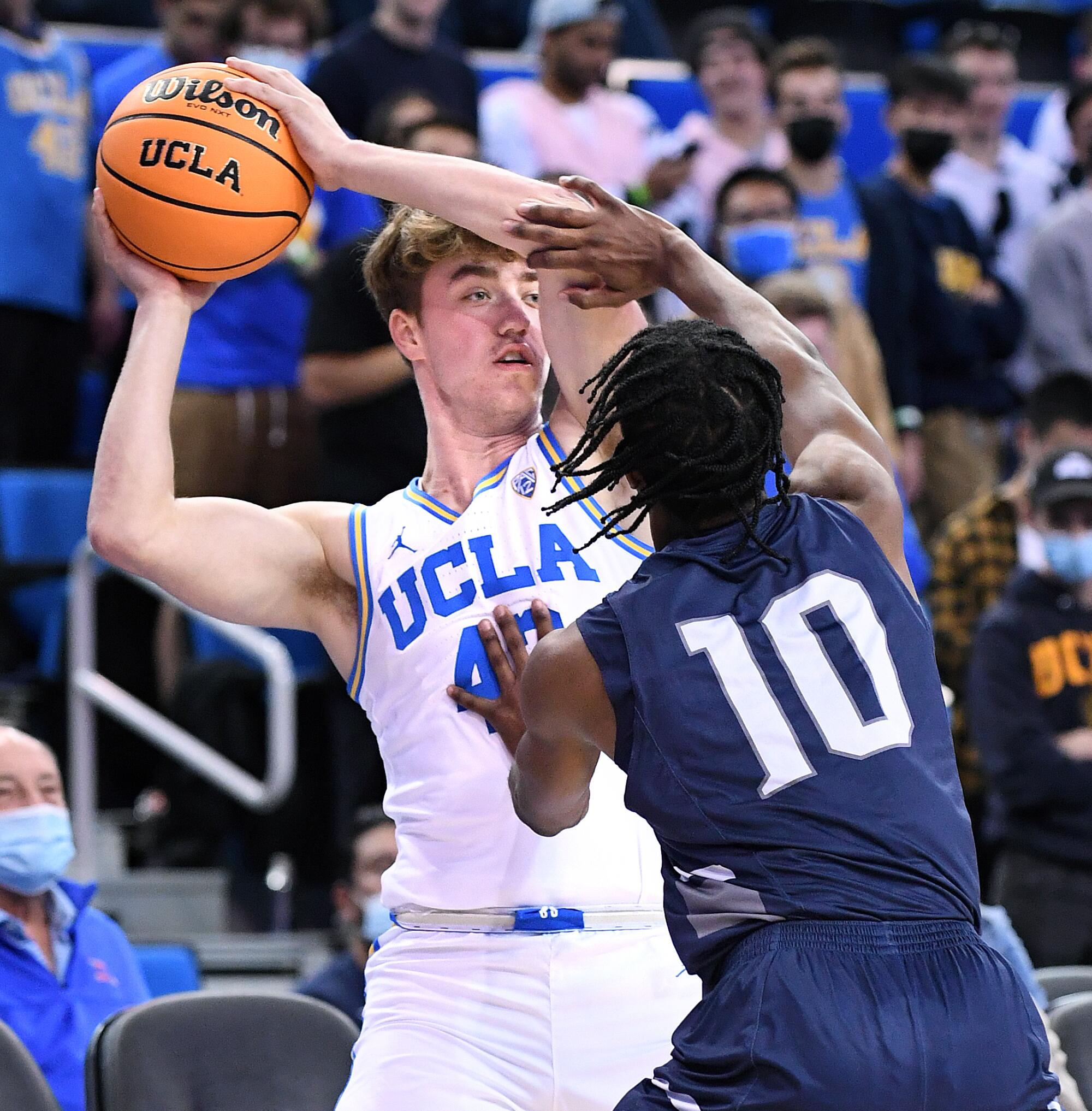 UCLA's Russell Stong holds the ball during a recent game against Northern Florida 