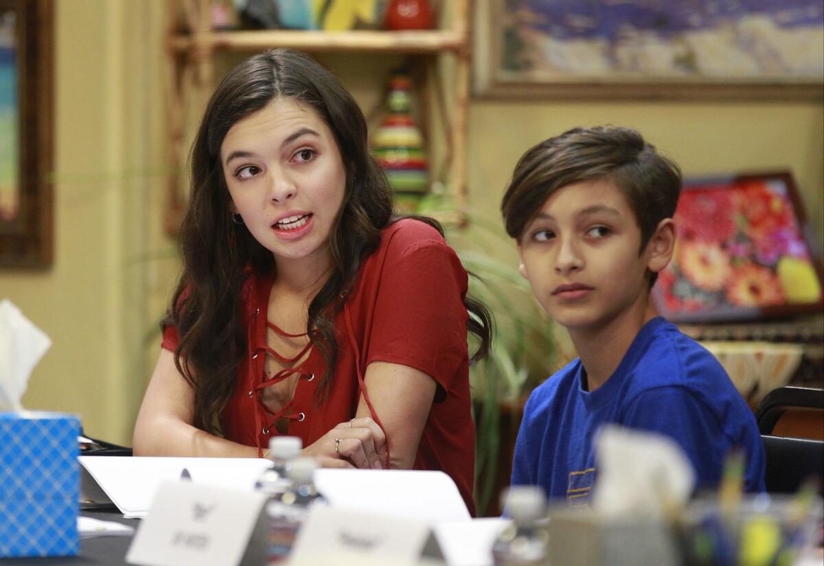 CULVER CITY, CA., AUGUST 17, 2016--Table read of Netflix's all-Latino update of "One Day at a Time." Isabella Gomez and Marciel Ruiz rehearse the lines. (kirk McKoy / Los Angeles Times)