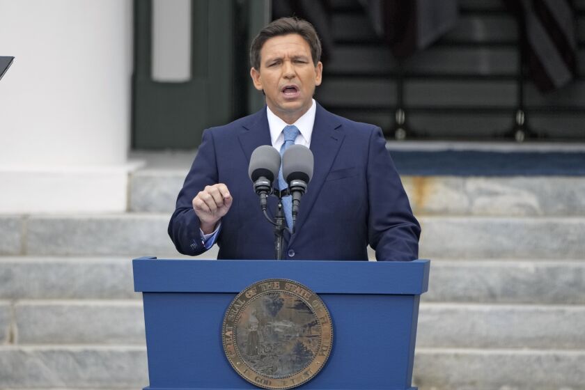 FILE - Florida Gov. Ron DeSantis speaks after being sworn in to begin his second term during an inauguration ceremony outside the Old Capitol Jan. 3, 2023, in Tallahassee, Fla. DeSantis may be months away from publicly declaring his presidential intentions, but his potential rivals aren’t holding back. A half dozen high-profile Republican White House prospects have begun courting top political operatives in states like New Hampshire and Iowa. (AP Photo/Lynne Sladky, File)