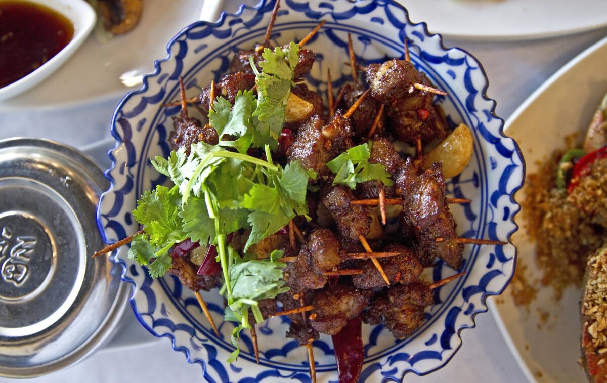 The lamb skewers at Garlic & Chives restaurant in Garden Grove.