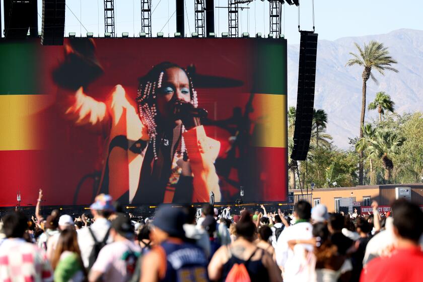 INDO-CA-APRIL 14, 2024: Ms. Lauryn Hill makes an appearance during YG Marley's set at Coachella on Sunday, April 14. 2024. (Christina House / Los Angeles Times)