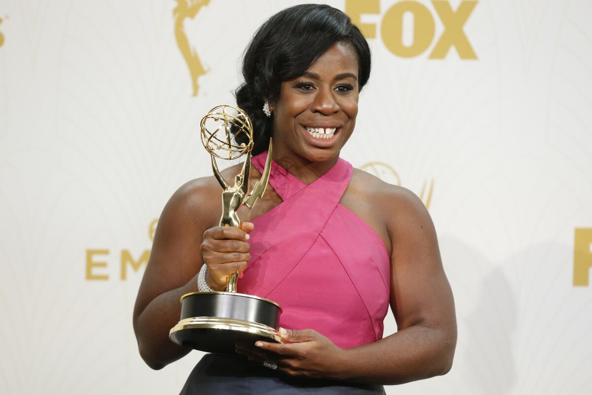 Uzo Aduba holds her supporting actress in a drama series Emmy for her performance in "Orange Is the New Black"