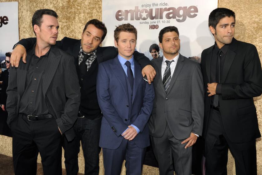 "Entourage" cast members, from left, Kevin Dillon, Jeremy Piven, Kevin Connolly, Jerry Ferrara and Adrian Grenier pose together at the premiere of the seventh season of the HBO series in Los Angeles.