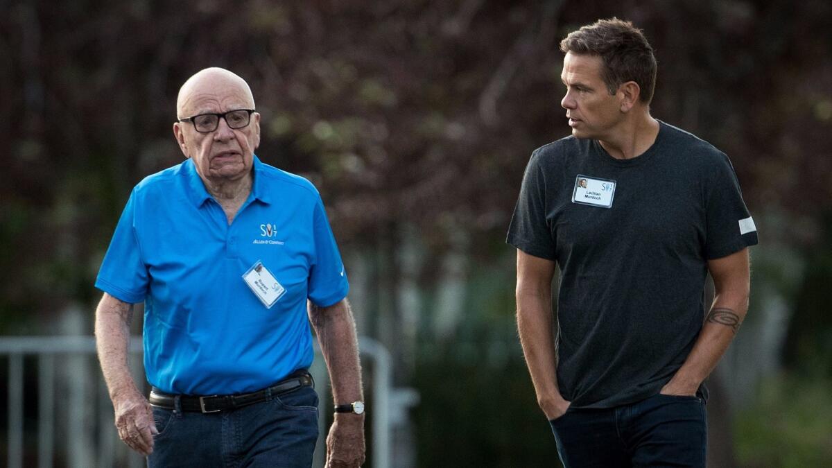 Rupert Murdoch, left, and his son Lachlan Murdoch at the annual Allen & Co. Sun Valley Conference in Sun Valley, Idaho, in July.