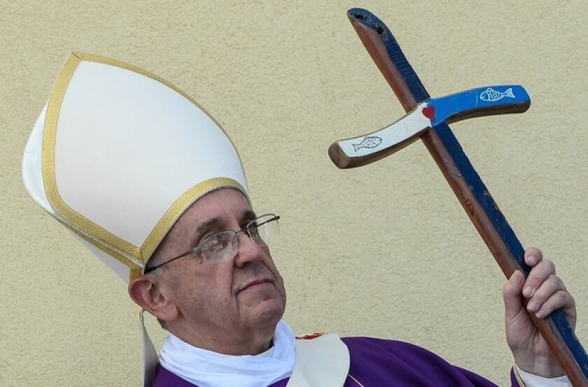 Pope Francis celebrates Mass during a visit on Monday to the Italian island of Lampedusa.