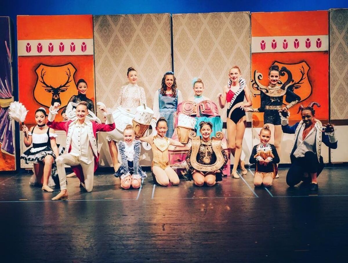 Ooh La La's musical theater program is rehearsing "Beauty and the Beast," shown in a photo from a past year's production. 