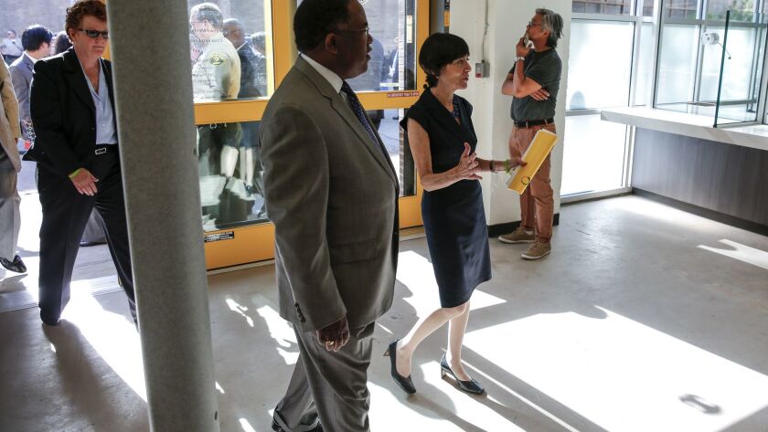 Los Angeles County Supervisor Mark Ridley-Thomas, center, at the 2015 opening of the new Downtown Mental Health Center in the skid row area of downtown L.A. The center's $10 million renovation was financed through the Mental Health Services Act Capital Projects Fund.